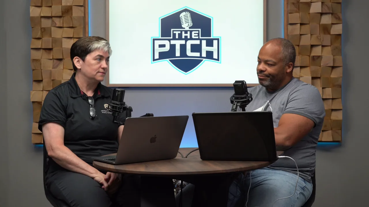The two co-hosts of The PTCH Podcast recording a health discussion across a round table in the Titan Podcasting studio