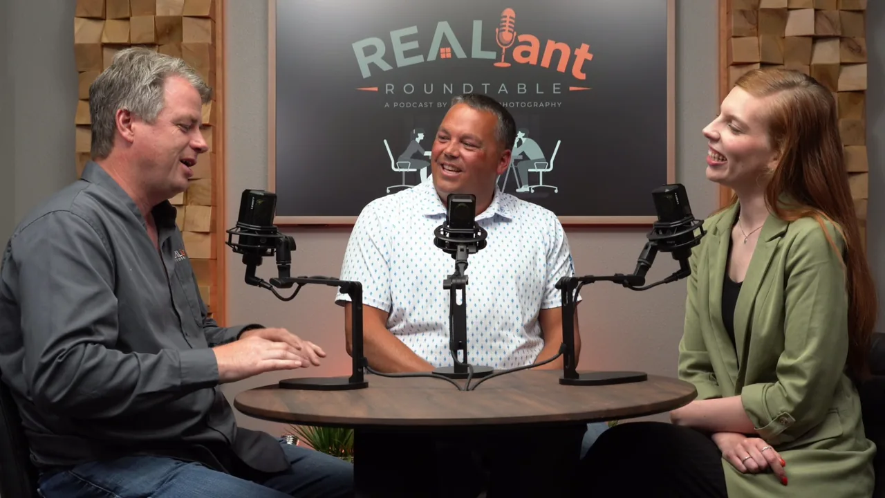 Three Realiant Roundtable participants recording together around a studio table
