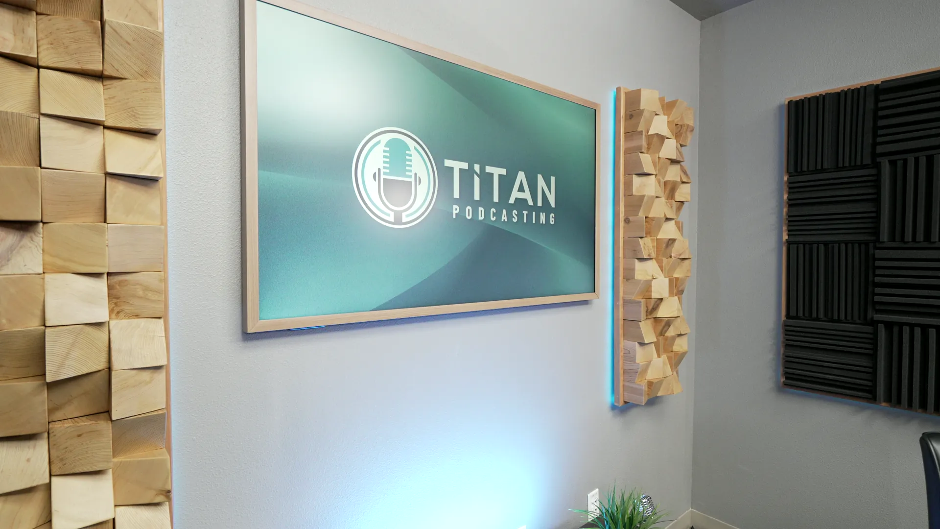 Titan Podcasting studio with branded production monitor